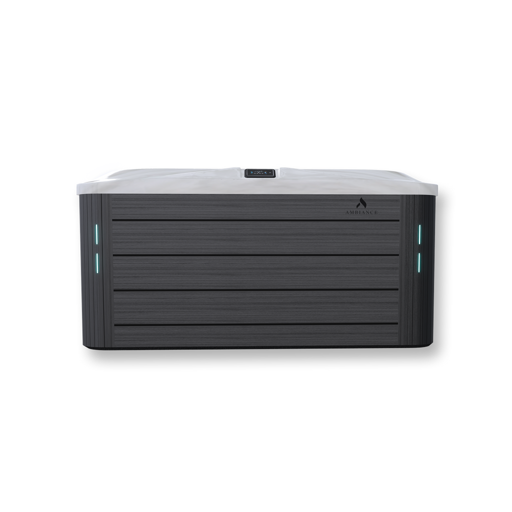 Thermēa L523 hot tub with LED waterline, backlit waterfall, and cup holders.”