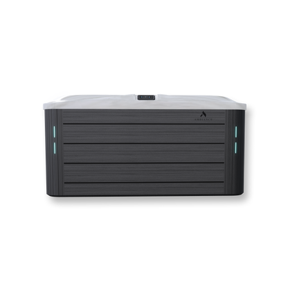 Thermēa L523 hot tub with LED waterline, backlit waterfall, and cup holders.”